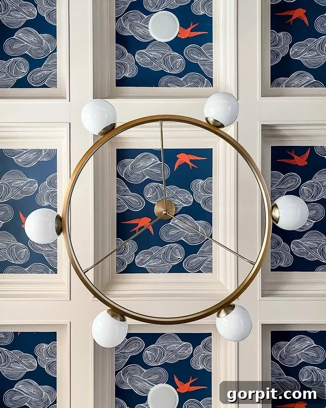 18 Wallpaper Gems to Transform Your Digital Space 4 Elegant dining room with a stunning coffered ceiling beautifully adorned with intricate wallpaper, creating a sophisticated 'fifth wall' effect.