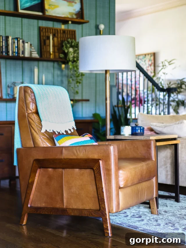 West Elm Spencer recliner review- photo of leather recliner in colorful family room of Tasha Agruso of Kaleidoscope Living