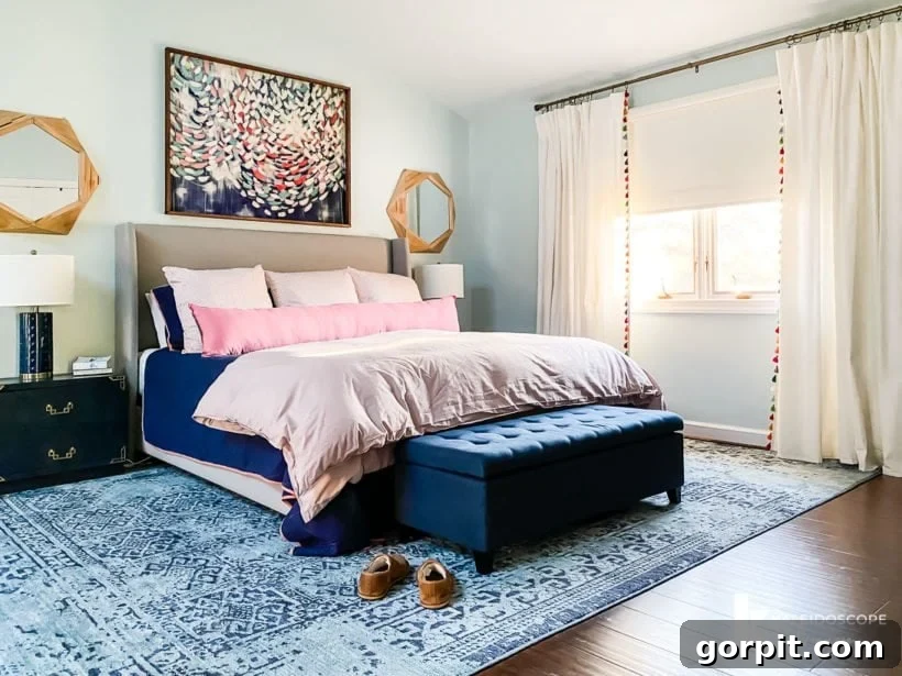A 9' x 12' bedroom rug thoughtfully placed under a king-size bed, fully accommodating the bed and nightstands.