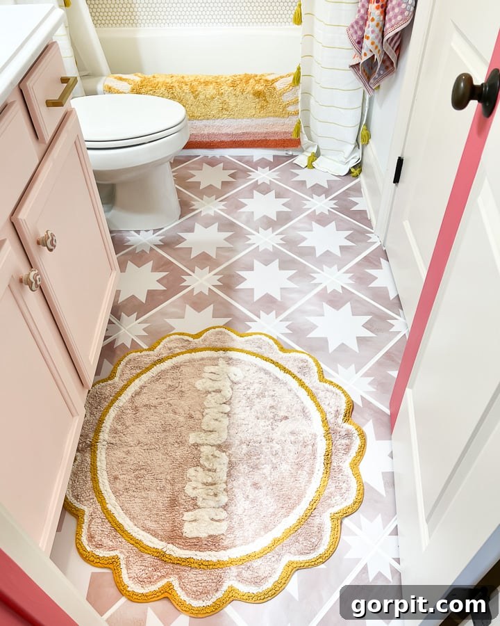 Tile Stickers: The Ultimate Guide 2 tile stickers on floor in girl's bathroom