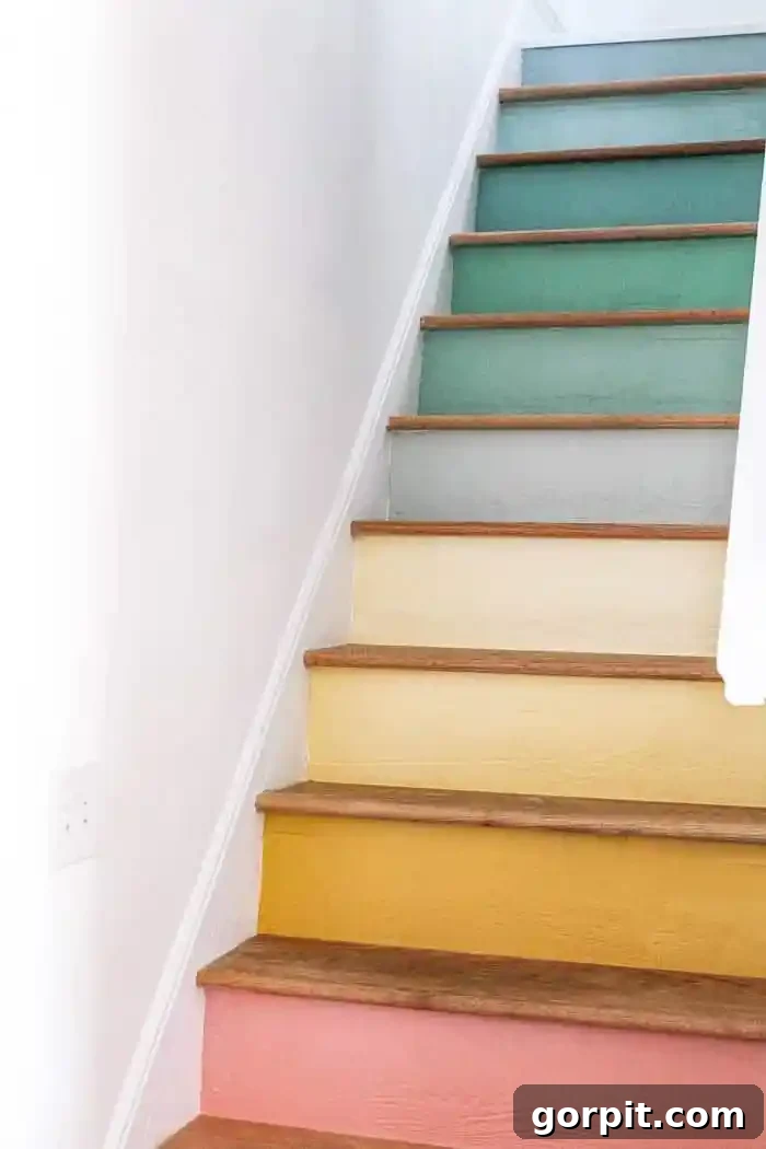 Creative DIY Staircase Transformations 19 colorful painted stairs DIY