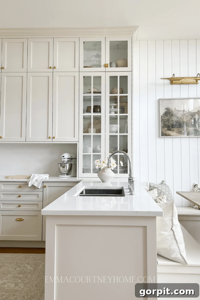 Timeless Neutral Colors for Stunning Kitchen Cabinets 11 Natural Cream by Benjamin Moore cabinets and white walls in kitchen