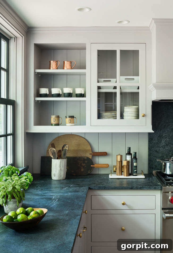 Timeless Neutral Colors for Stunning Kitchen Cabinets 13 Dove Tale by Farrow and Ball on kitchen cabinets with green countertops and open shelving