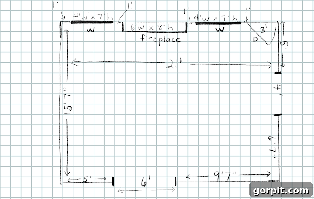 A simple, hand-drawn space plan on graph paper depicting a family room layout with furniture.