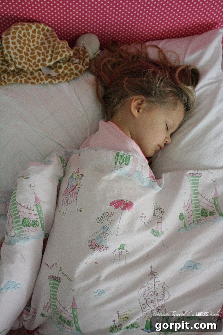 Crafting Your Own Bespoke Duvet 8 Finished DIY duvet cover on a child's bed, demonstrating the ease and success of using flat sheets for custom bedding.