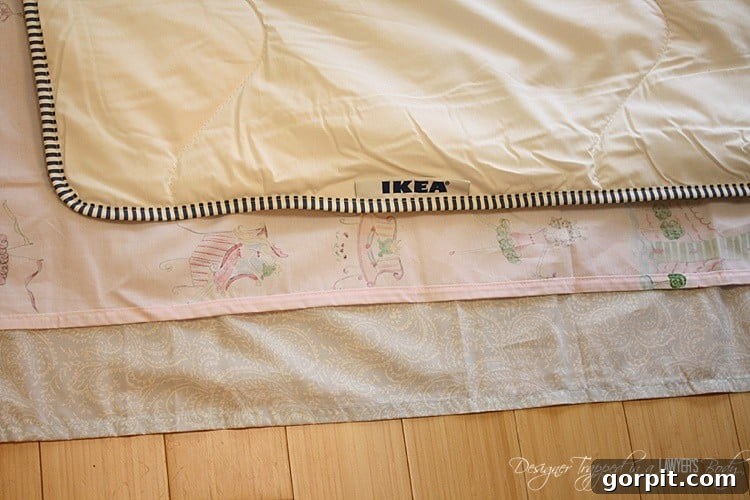 Crafting Your Own Bespoke Duvet 3 Lay out two flat sheets with right sides together, then place your comforter on top, aligning with the top and right edges, ready for custom sewing.
