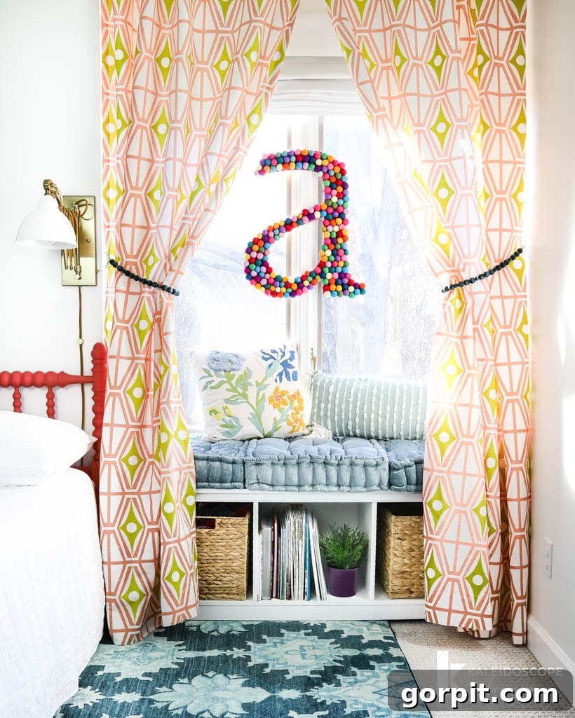 young girls reading bench with cushions and storage underneath, framed by geometric print curtains, showcasing smart storage