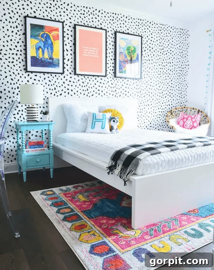 bright bedroom with black and white polka dot wallpaper, vivid art, and white bedding, celebrating bold style