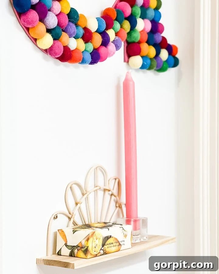 Vibrant bathroom decor with a large decorative 'A' letter, adding a unique and personal touch.