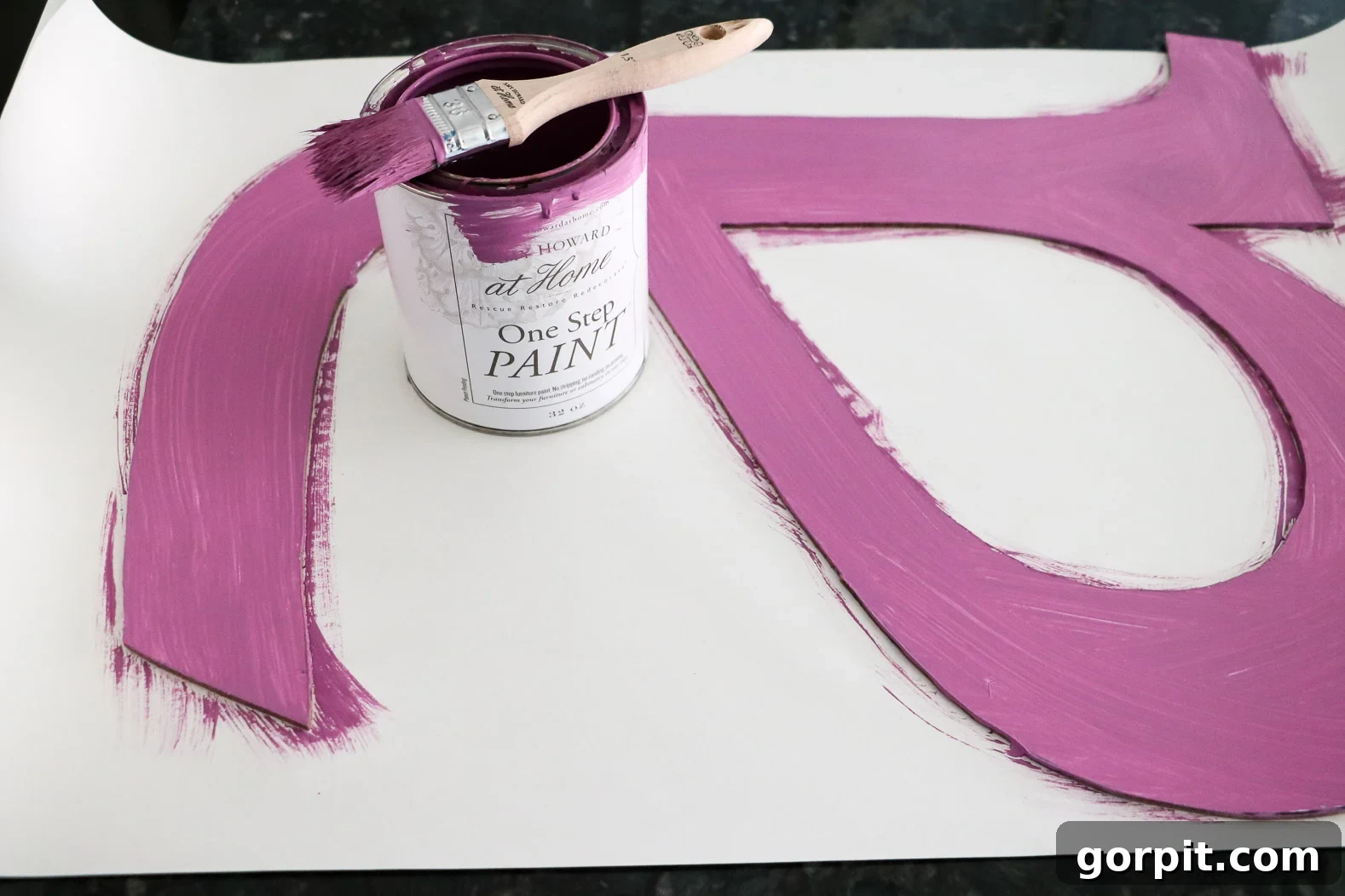Elevate Your Decor with Handmade Giant Letters 6 Large DIY wall letter painted in a purple hue, ready for felt ball application