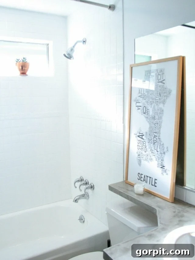 Affordable Bathroom Transformations: Smart DIY Renovation Ideas 24 Shower tiles painted white using a DIY kit, transforming formerly brown tiles into a clean, modern surface.