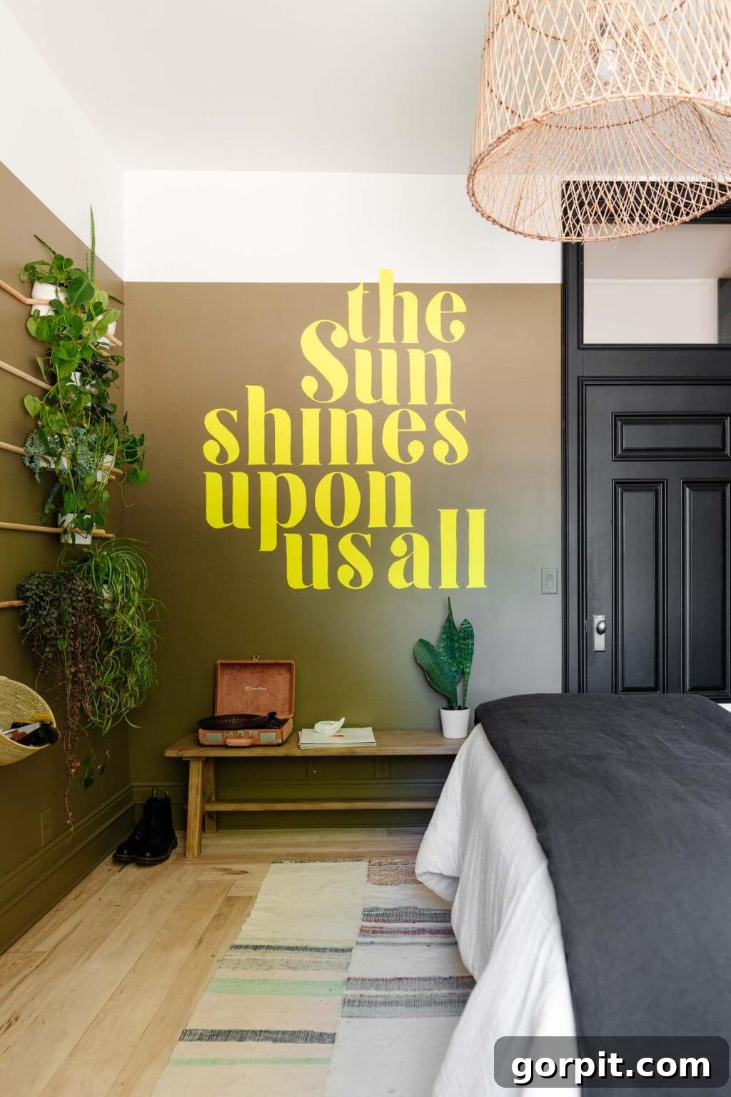 25 Fresh Teen Room Makeover Ideas for Guys and Girls 17 A vibrant teen girl's bedroom featuring an impressive wall adorned with lush plants, creating a natural focal point. The wall also displays the inspiring message
