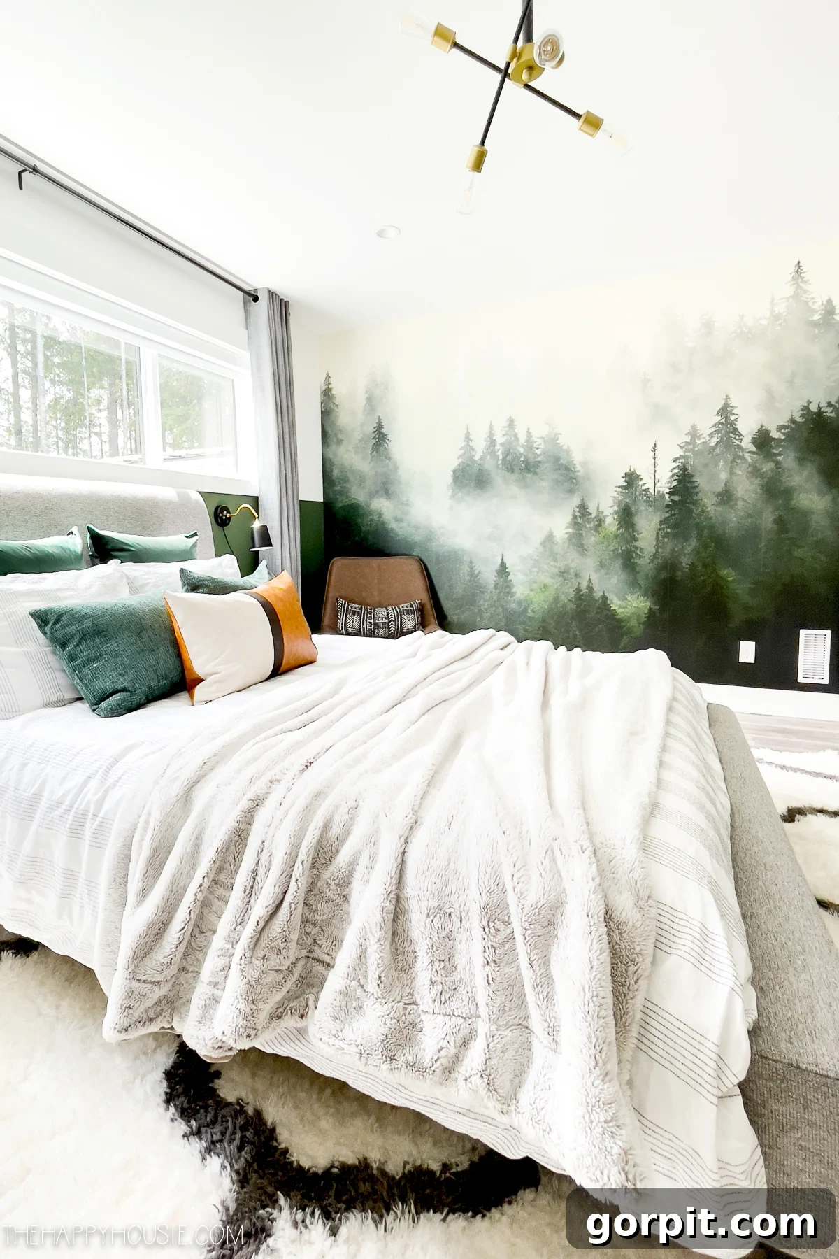 25 Fresh Teen Room Makeover Ideas for Guys and Girls 25 An immersive evergreen forest wall mural creates a captivating backdrop next to a bed adorned with white blankets in a sunny teen boy's bedroom, bringing the outdoors in.