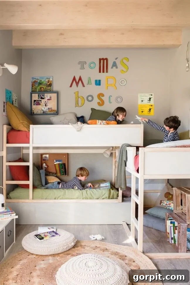 triple bunk bed with kids laying in each bed and primary color decor