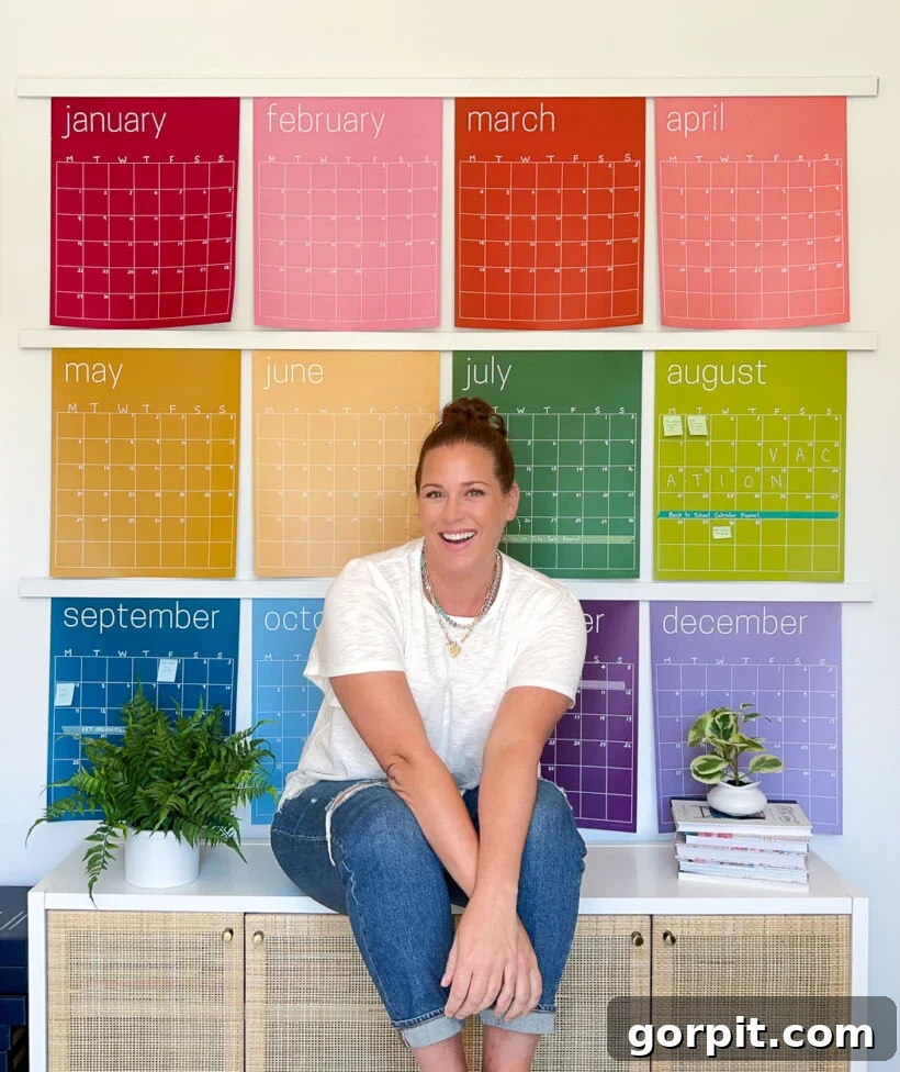 Smart Magnetic Poster Mounts 10 Large, vibrant wall calendar displayed beautifully in an office space using custom DIY oversized magnetic poster hangers.