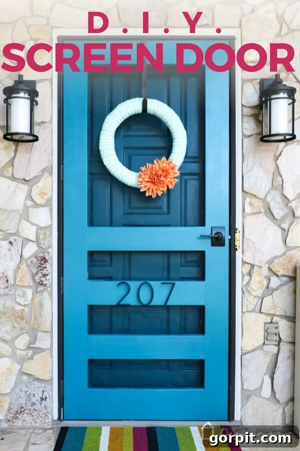 Craft Your Custom Screen Door 2 Beautiful teal blue custom DIY screen door with stone surround, enhancing home exterior.