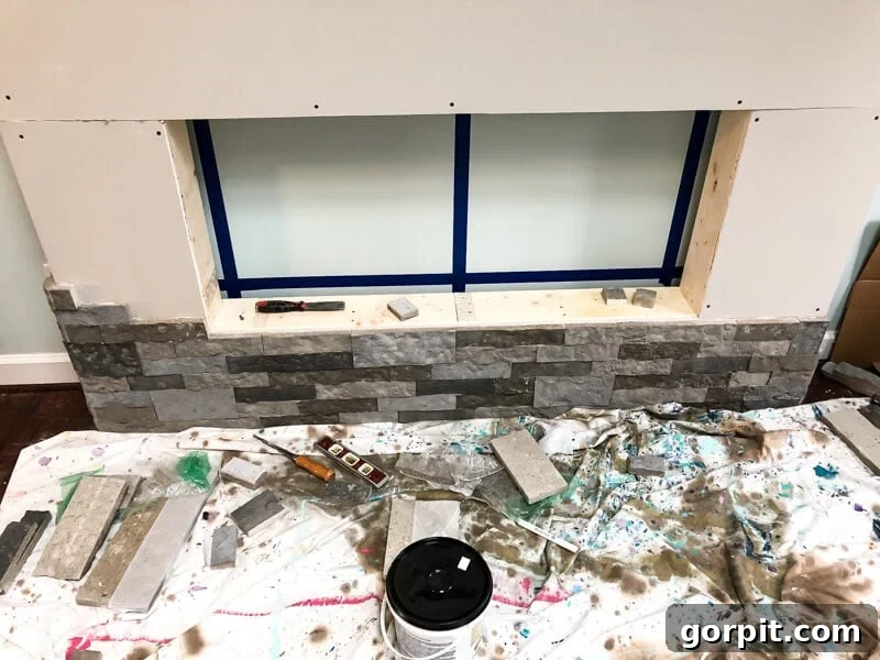 Close-up of AirStone being applied to the fireplace surround