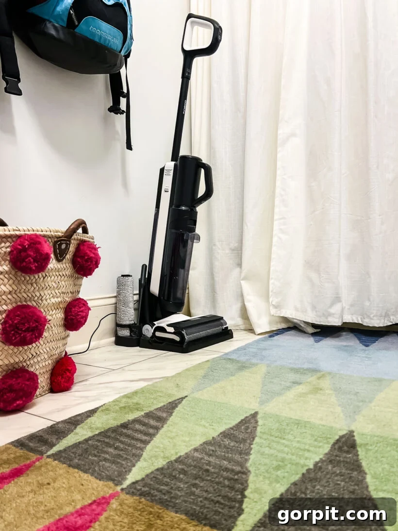 Tineco Vacuum Mop Candid Evaluation 8 Tineco hard floor cleaner on charging dock in colorful laundry room