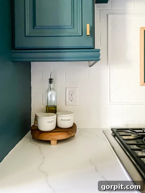 Small section of painted countertops beside cooktop showing limited prep space