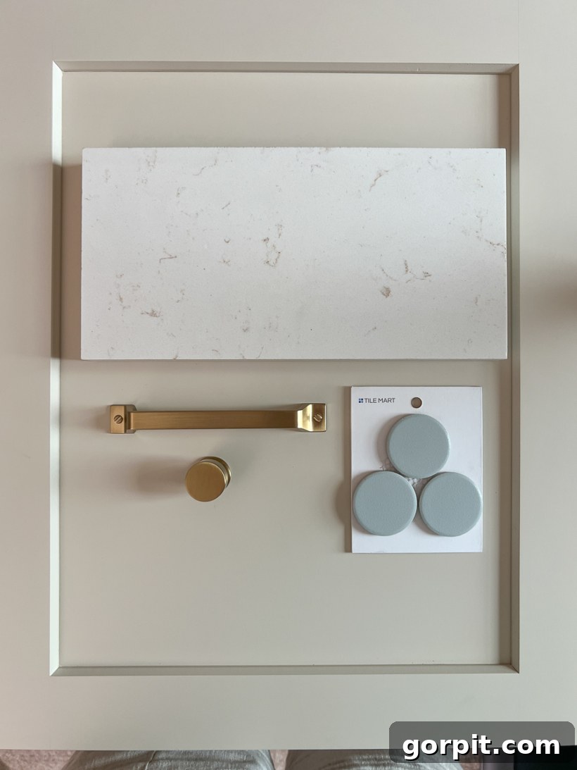 accessible beige shaker cabinet door paired with elegant countertop and hardware selections, highlighting the chosen neutral aesthetic