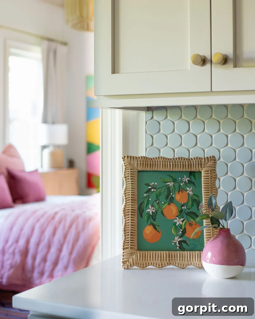 Our Kitchen Renovation Reveal A Perfect Blend of Neutral and Color 14 Close-up of the light blue oversized penny tile backsplash, contrasting beautifully with the Accessible Beige cabinets.