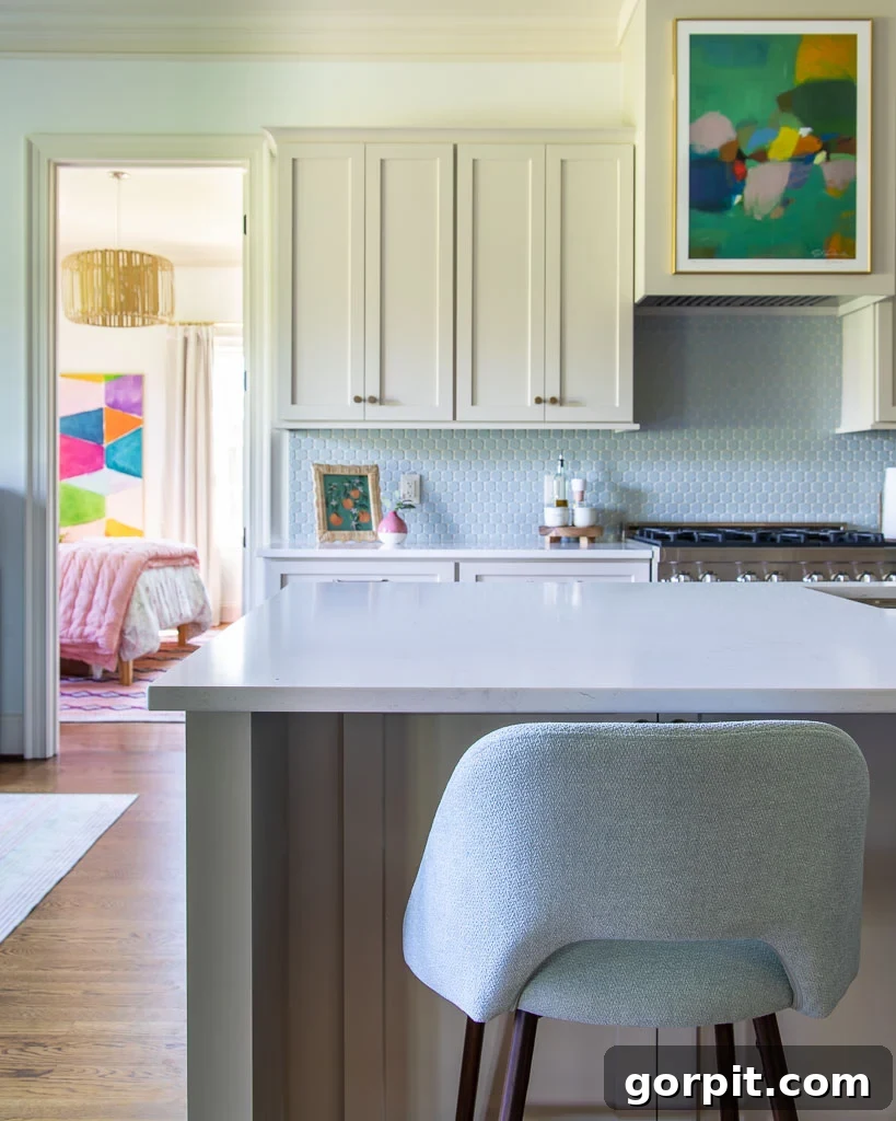Our Kitchen Renovation Reveal A Perfect Blend of Neutral and Color 16 A stunning abstract art print by Eleanor Scott Davis, serving as a focal point and vibrant color accent in the kitchen.