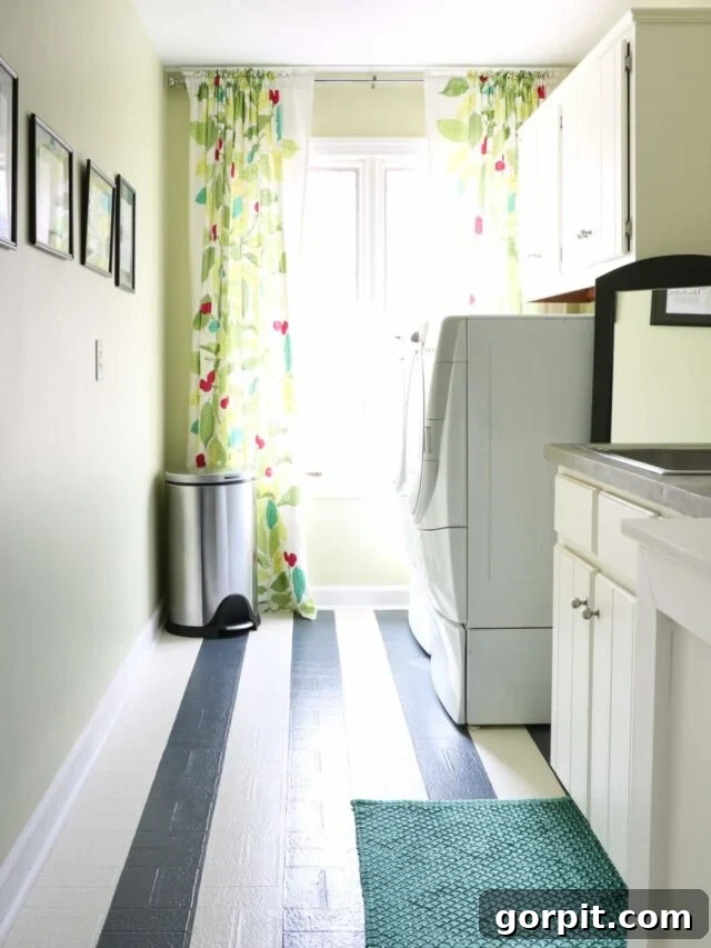 Image of a colorful laundry room featuring beautifully painted vinyl floors in a vibrant stripe pattern, demonstrating a creative, durable, and budget-friendly floor makeover solution.