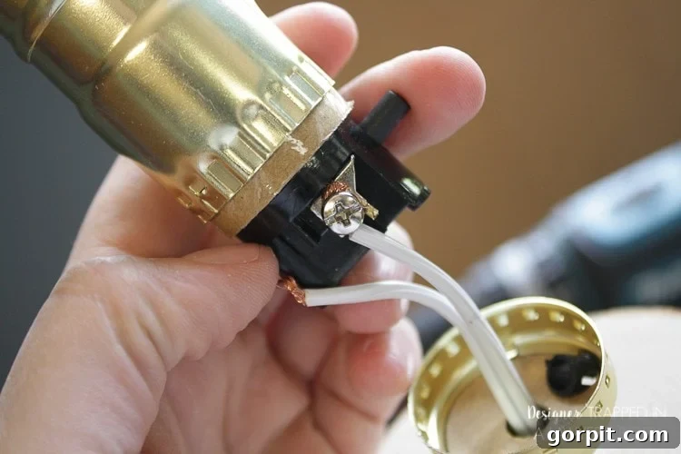 Connecting the Electrical Wires to the Lamp Socket Terminals