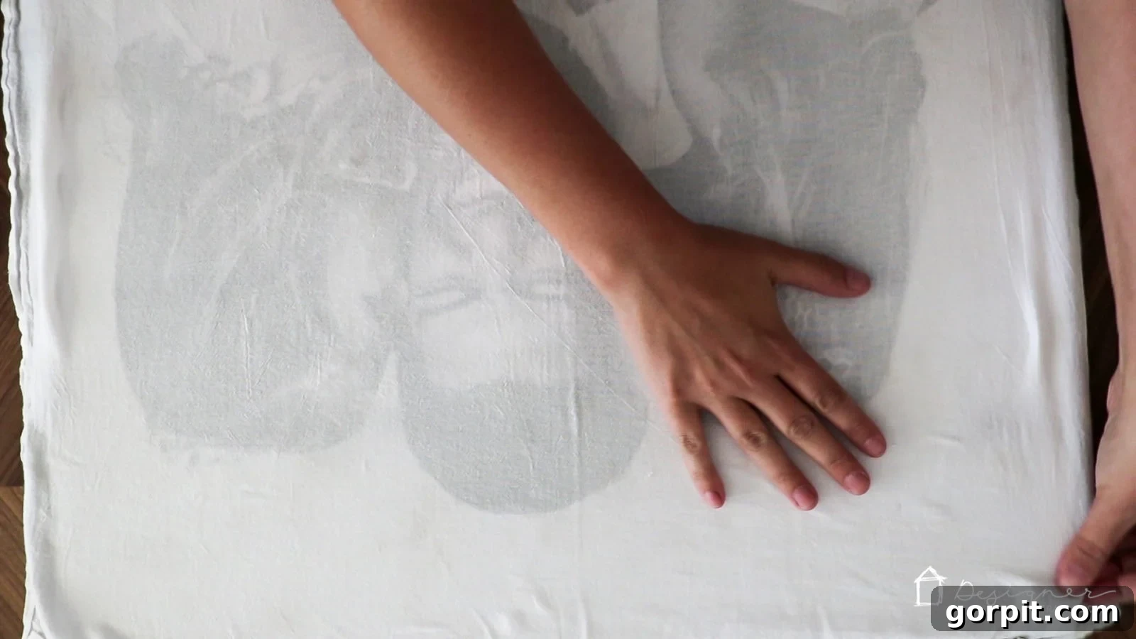 Applying texture to a photo canvas using a fabric towel