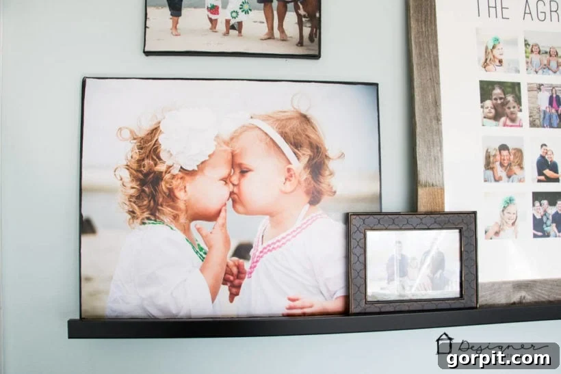 Close-up of a DIY photo canvas showcasing little girls