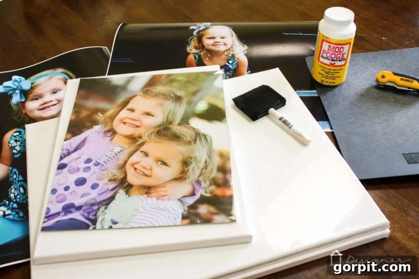 Materials laid out for making a DIY photo canvas
