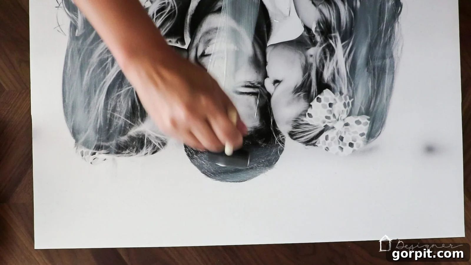 Applying a final layer of Mod Podge over the photo for texture