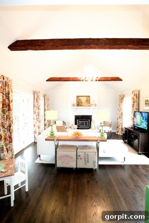 Faux Wood Beams Your Ceiling Masterpiece 13 A beautifully decorated family room featuring newly installed faux wood beams, adding rustic charm and architectural interest.