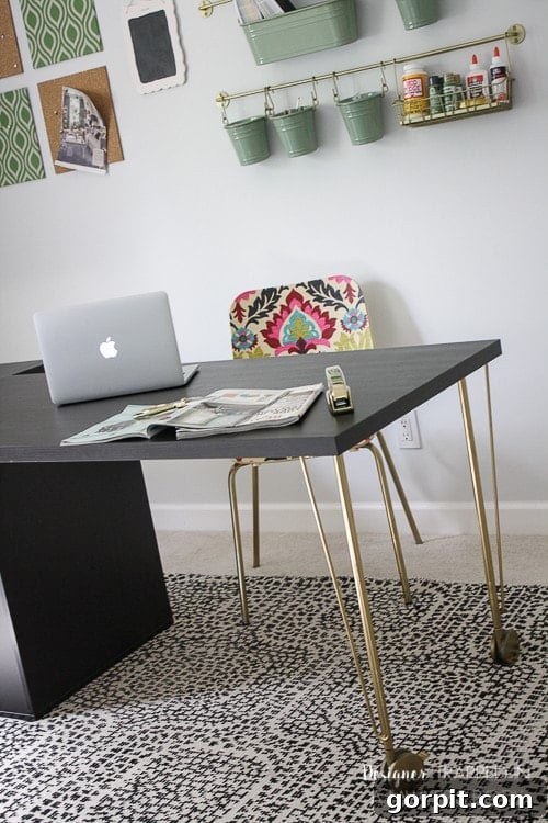 Stylish IKEA desk hack completed, featuring a gold-accented Krille leg supporting a white Linnmon tabletop, ready for a chic home office.