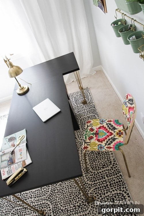 Close-up of the elegant gold Krille leg on the IKEA Linnmon desk, highlighting the custom designer touch achieved on a budget.