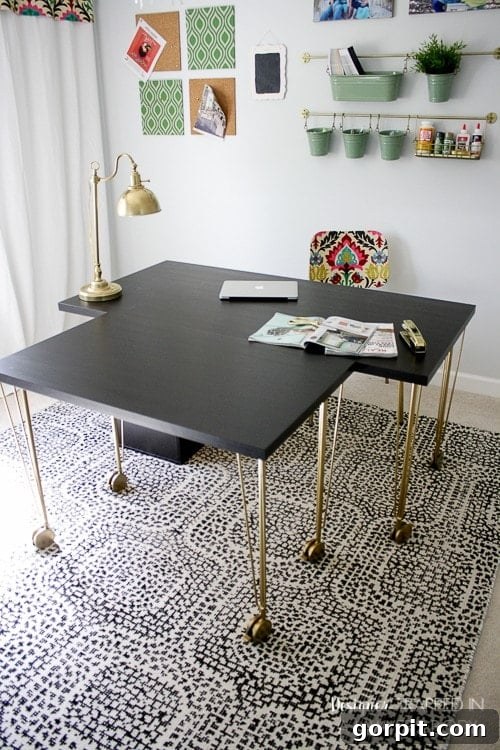 Configurable IKEA desk hack showing two Linnmon tables pushed together, providing an expansive surface perfect for large craft projects like sewing.