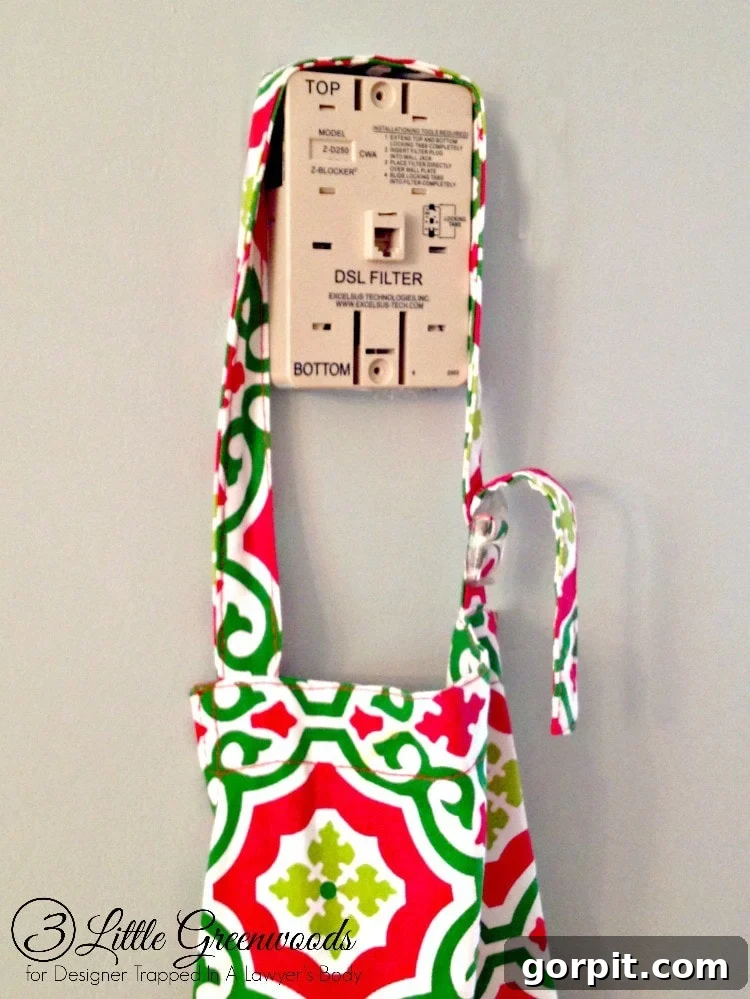 GENIUS! Come learn how to hide a phone jack with this easy tutorial by 3 Little Greenwoods for Designer Trapped in a Lawyer's Body!