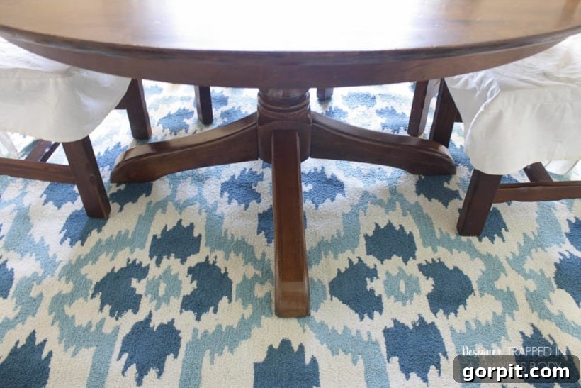 Refinished table legs and pedestal base, looking new and elegant.