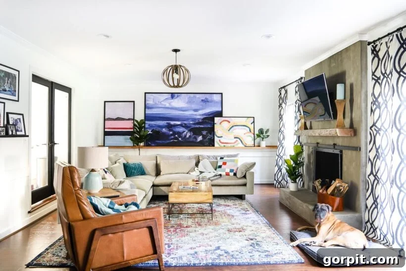 Stylish family room showcasing a minimalist DIY concrete fireplace, emphasizing modern design.