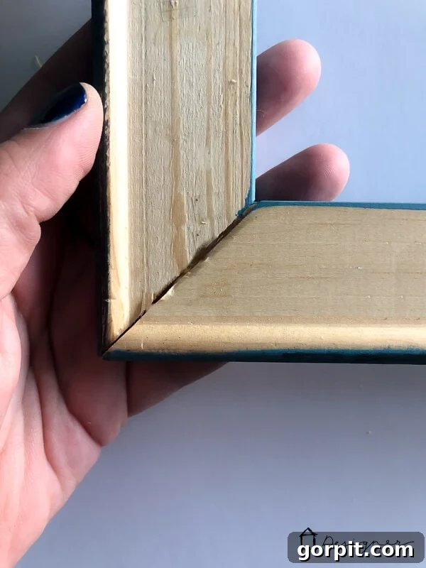 Finalizing DIY picture frame structure with adhesive