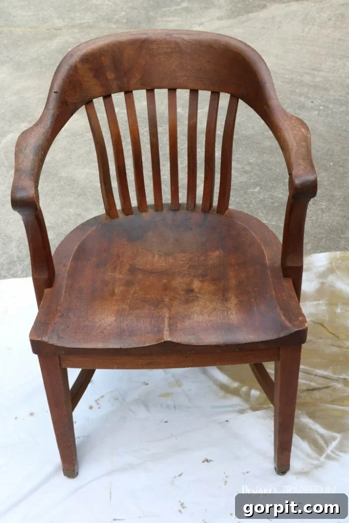 Revitalize Your Wood Chairs Effortlessly 14 Before photo of Chair #1 showing staining and wear