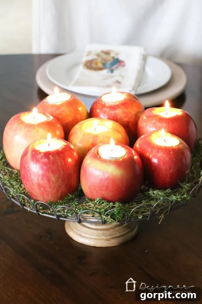 Sweet-Scented Apple Candles: Your DIY Guide 7 Close-up of fresh apples turned into tealight candle holders for a fall or holiday table